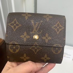 1997 authentic Louis Vuitton wallet - 2 rips inside